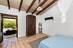 Posteľ alebo postele v izbe v ubytovaní Casa Sa Mata