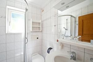 Koupelna v ubytování Hotel - Pension Fortuna
