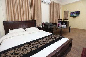 Postel nebo postele na pokoji v ubytování Hotel Hema + 37 fotografií