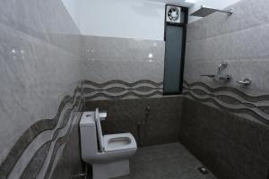 Kopalnica v nastanitvi Hotel Hema