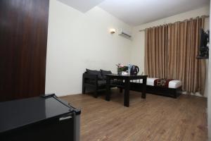 TV in/ali zabaviščno središče v nastanitvi Hotel Hema