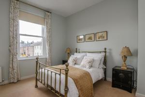 En eller flere senge i et værelse på 20 village square Glaslough