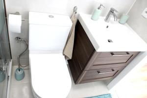 Kúpeľňa v ubytovaní Apartamenty pod Wilczakiem