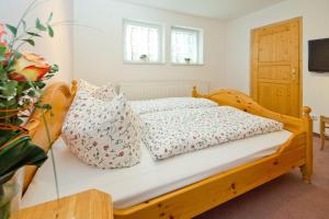 Postel nebo postele na pokoji v ubytování Hotel Garni Am Klostermarkt