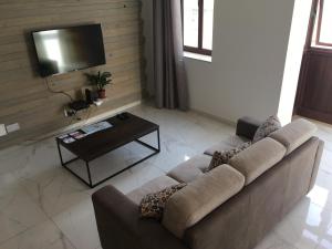 TV a/nebo společenská místnost v ubytování Seaside Room