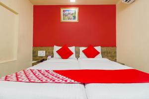 Postel nebo postele na pokoji v ubytování Hotel Arma Residency