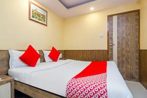 Postel nebo postele na pokoji v ubytování Hotel Arma Residency