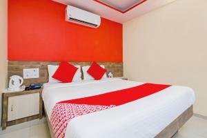 Postel nebo postele na pokoji v ubytování Hotel Arma Residency