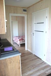 Posteľ alebo postele v izbe v ubytovaní Apartamenty pod Wilczakiem
