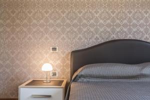 Posteľ alebo postele v izbe v ubytovaní Ca' Del Monastero 3 Collection Apartment for 4 Guests with Lift
