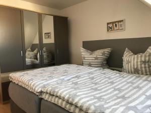 Ένα ή περισσότερα κρεβάτια σε δωμάτιο στο Pensione da Vito