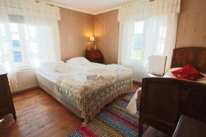 Postel nebo postele na pokoji v ubytování Elves Village Hotel