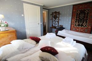 Postel nebo postele na pokoji v ubytování Elves Village Hotel