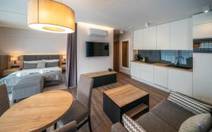 Posteľ alebo postele v izbe v ubytovaní Meta Apartments