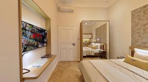 Łóżko lub łóżka w pokoju w obiekcie Bentis Luxury Apartments