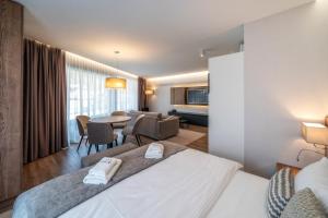 Posteľ alebo postele v izbe v ubytovaní Meta Apartments