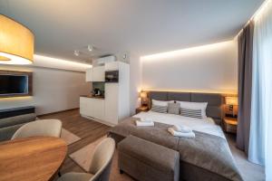 Posteľ alebo postele v izbe v ubytovaní Meta Apartments