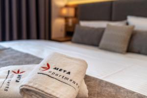 Posteľ alebo postele v izbe v ubytovaní Meta Apartments