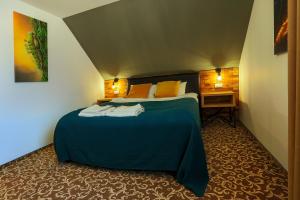 Postel nebo postele na pokoji v ubytování Residence Rooms Bucovina