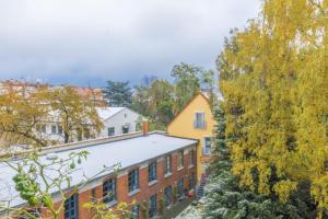 an aerial view of a house with a roof at Private Apartment in Hannover +6 photos