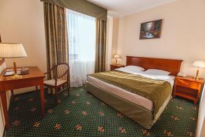 Кровать или кровати в номере Шаляпин Палас Отель