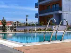 Bazén v ubytování Green Hills Suites nebo v jeho okolí