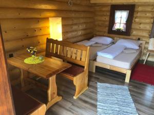 A bed or beds in a room at Camp PACHO