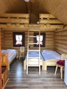 A bed or beds in a room at Camp PACHO Még 37 kép