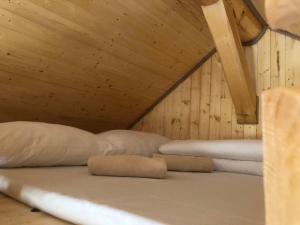 A bed or beds in a room at Camp PACHO