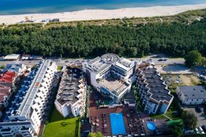 an aerial view of a resort near the beach at Maloves Resort & Spa in Władysławowo