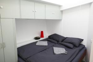 Postel nebo postele na pokoji v ubytování Boathotel Rotterdam Wilhelmina + 20 fotografií