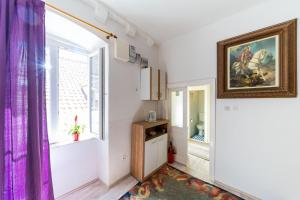 Kuchyň nebo kuchyňský kout v ubytování Rooms Katja & Lara