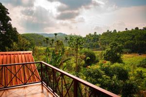 Un balcon sau o terasă la Sharanyam Homestay