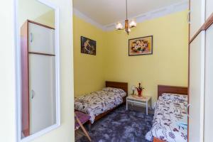 Postel nebo postele na pokoji v ubytování Rooms Katja & Lara