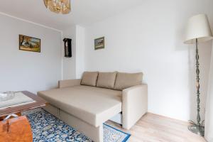 Ein Sitzbereich in der Unterkunft Private Apartment