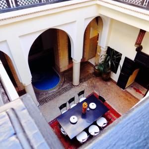 an overhead view of a dining table in a house at Riad Les Trois Palmiers El Bacha in Marrakech