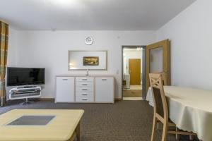 TV a/nebo společenská místnost v ubytování Private Apartment