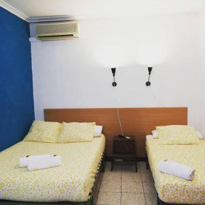 Postel nebo postele na pokoji v ubytování Pensión Fortea
