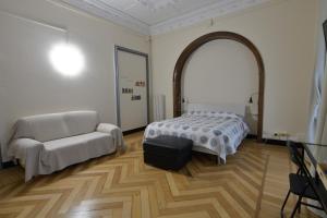 Postel nebo postele na pokoji v ubytování Check-Inn Rooms Genova Centro