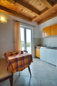 Kuchyň nebo kuchyňský kout v ubytování Villa Carmen