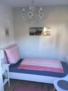سرير أو أسرّة في غرفة في Zur Agger