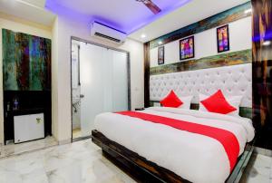 Postel nebo postele na pokoji v ubytování Delhi Guest House at New Delhi Railway Station