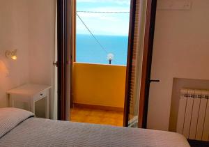 A bed or beds in a room at Hotel Villa Rita