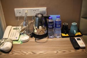 a table topped with a blender and other items at Shanghai Fish Inn Bund in Shanghai