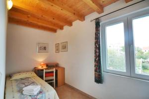 Postel nebo postele na pokoji v ubytování Villa Carmen
