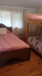 Ein Bett oder Betten in einem Zimmer der Unterkunft Wool & Wood House