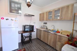 Kuchyň nebo kuchyňský kout v ubytování Kaza apartment