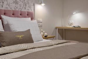 Łóżko lub łóżka w pokoju w obiekcie Bentis Luxury Apartments