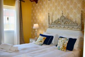 Uma cama ou camas num quarto em Villa Silene