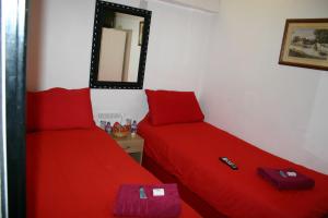 A bed or beds in a room at Liverpool Lodge 